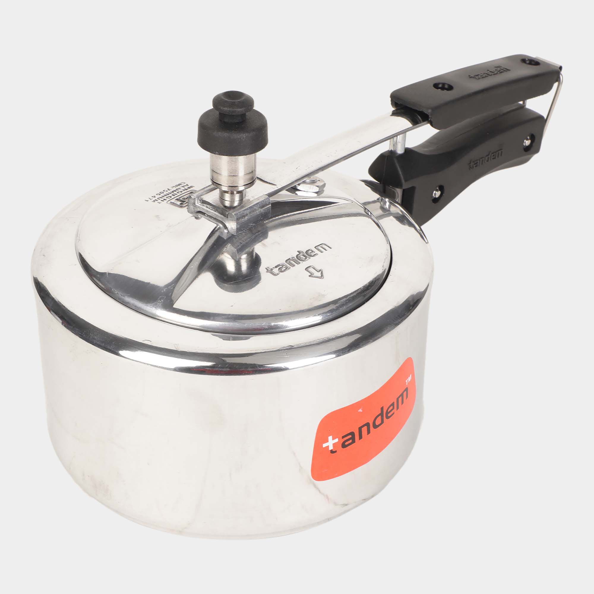 Tandem clearance induction cooker